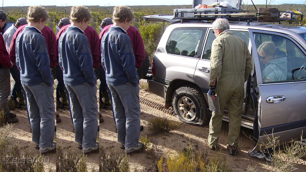 15-Ouch, a new tyre gets staked on the Border Track.JPG